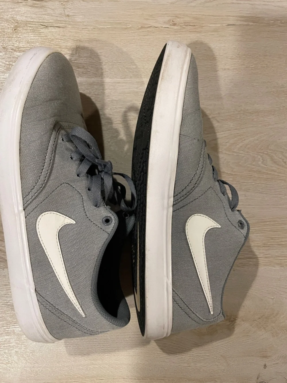 Nike Gray Canvas Low-Top Sneakers with White Swoosh
